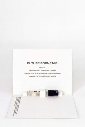 one small parfum testers. the vial is labeled 'NAMILIA FUTURE PORNSTAR'.