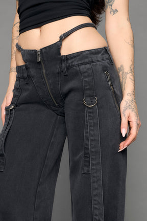 model wearing black grey denim with belt and thong