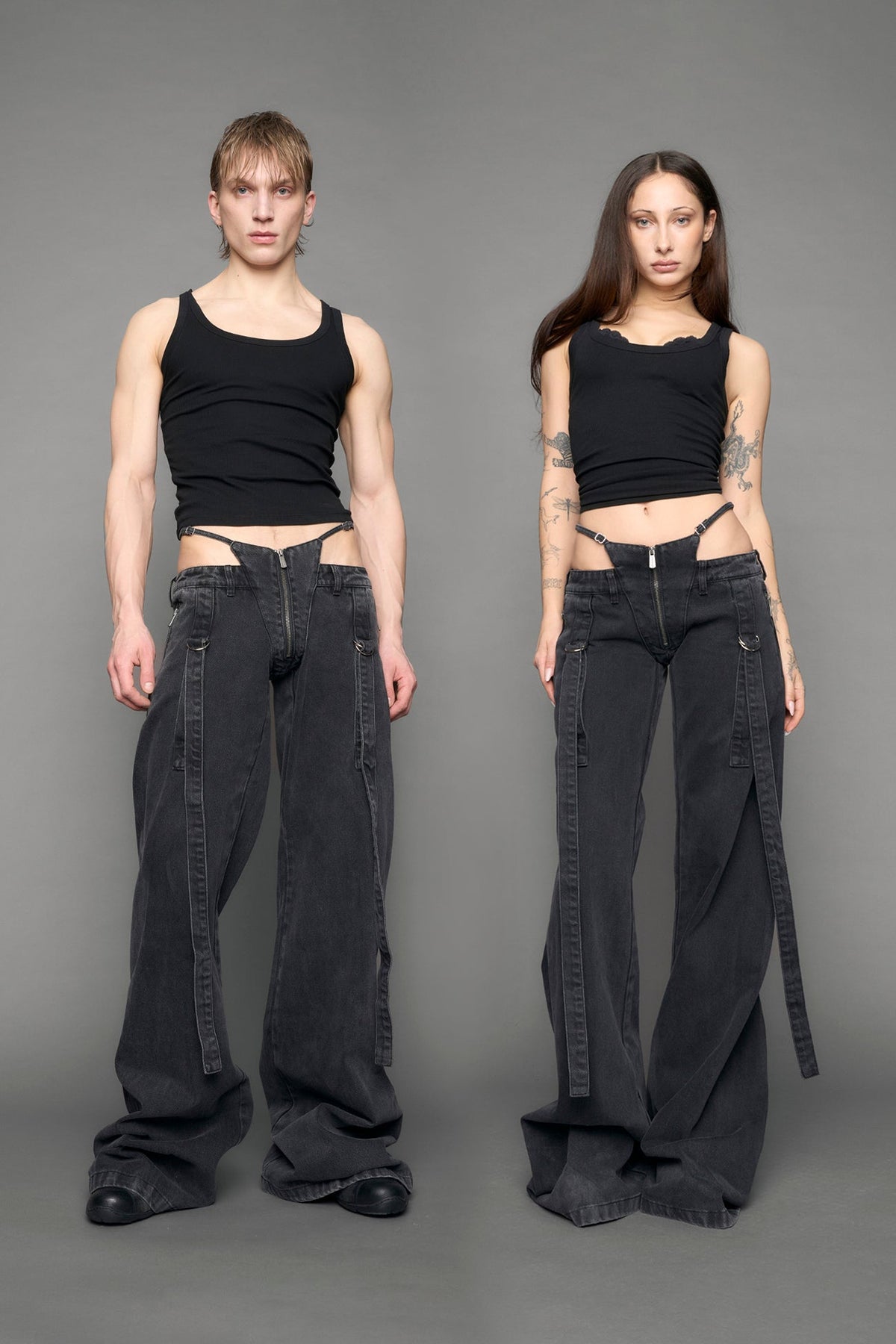 model wearing black grey denim with belt and thong