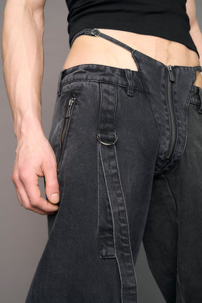 model wearing black grey denim with belt and thong