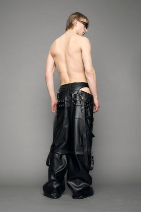 model wearing black vegan leather cargo panty pants