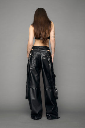 model wearing black vegan leather cargo panty pants