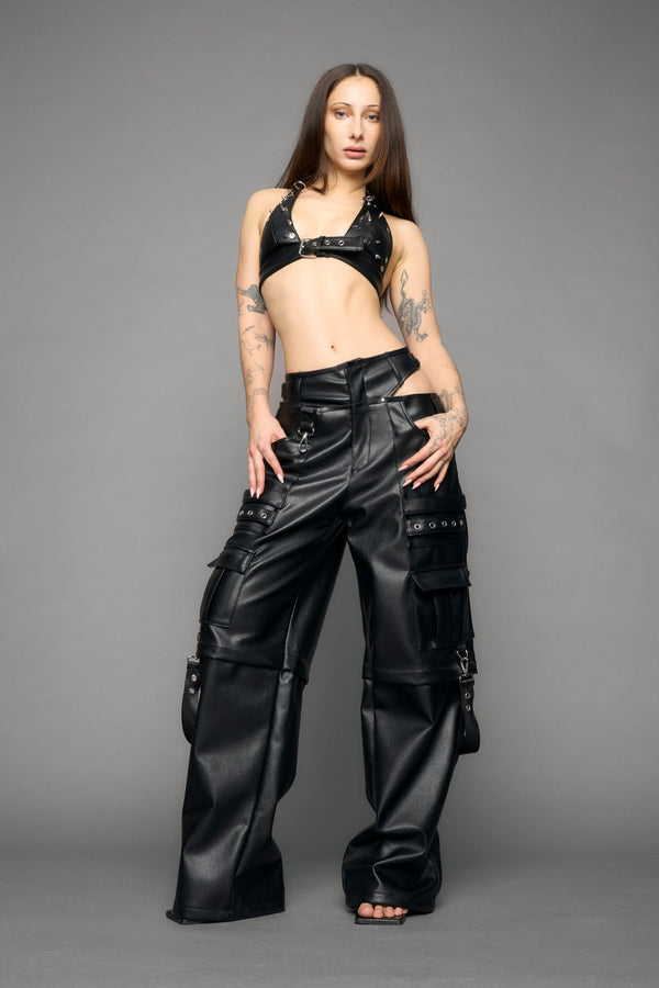 model wearing black vegan leather cargo panty pants