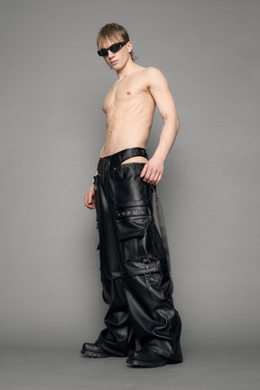 model wearing black vegan leather cargo panty pants