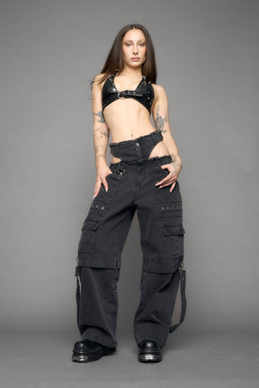 model wearing black denim cargo panty trousers