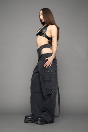 model wearing black denim cargo panty trousers