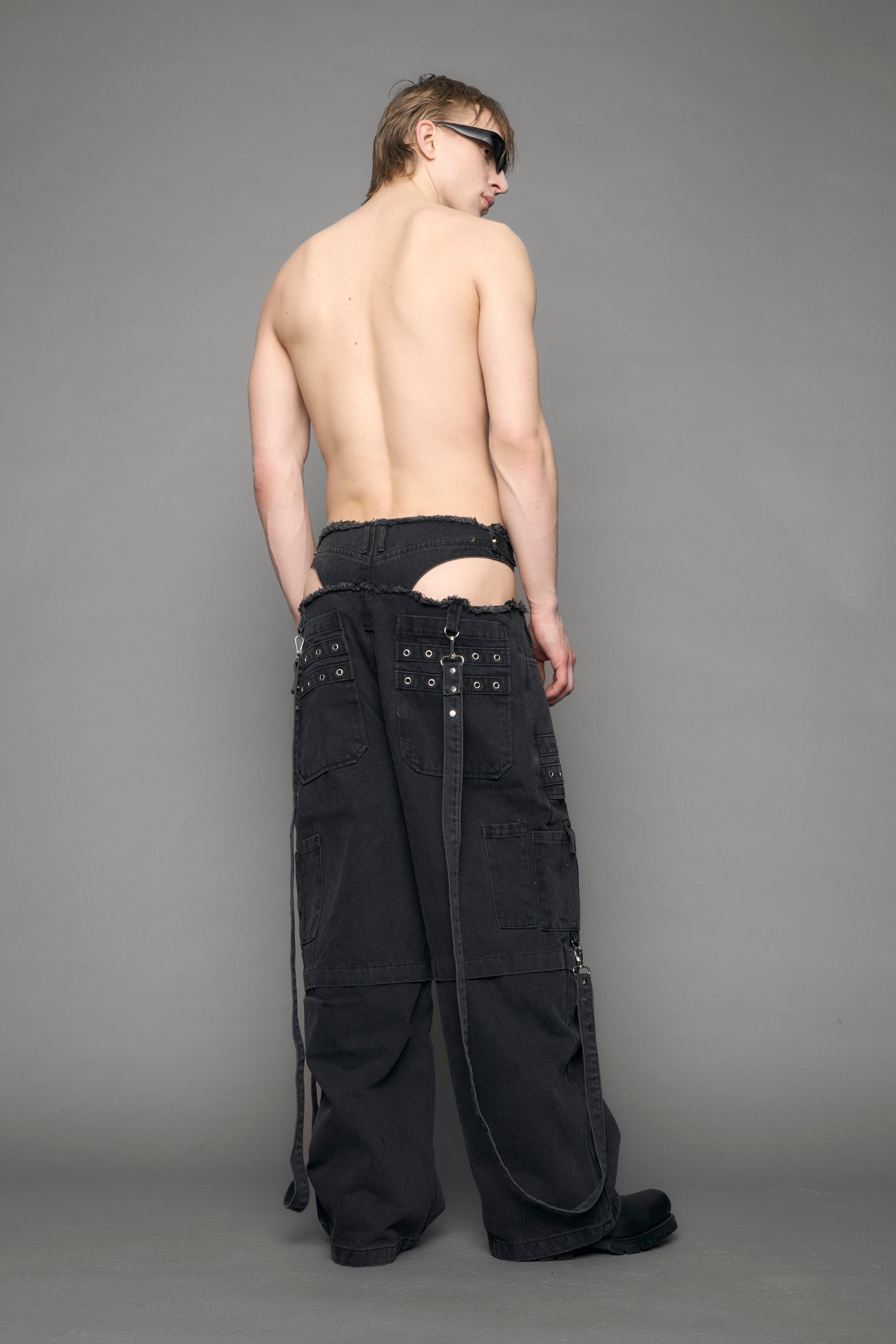 model wearing black denim cargo panty trousers