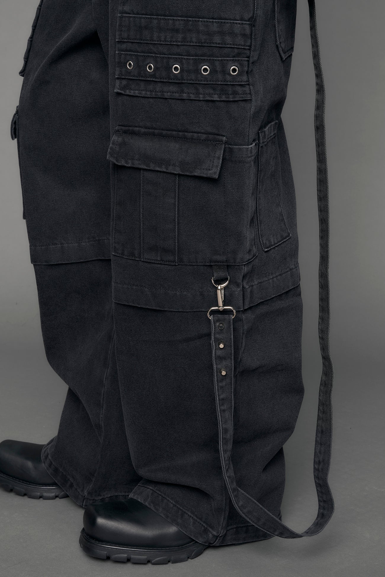 model wearing black denim cargo panty trousers