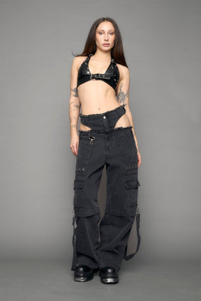 model wearing black denim cargo panty trousers