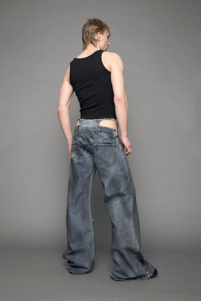model wearing blue denim thong pants used look