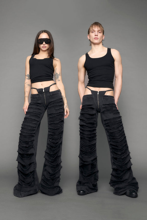 model wearing black denim thong pants used look - black wash