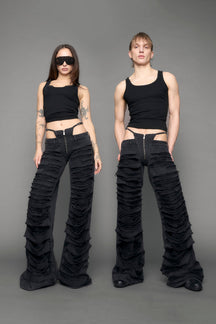 model wearing black denim thong pants used look