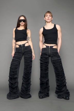 model wearing black denim thong pants used look