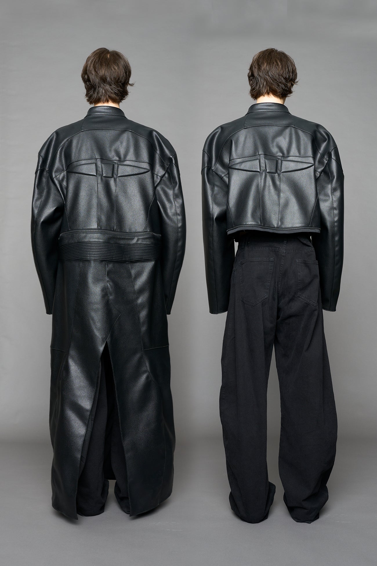 Detachable moto long coat in black vegan black leather inspired by a deconstructed full-body motocross racing suit, featuring padded panel details and a detachable zip design for two-way wear.