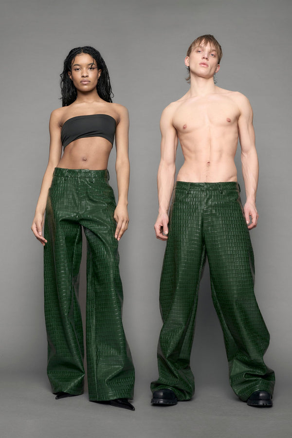 model wearing green vegan leather croc pants - GREEN