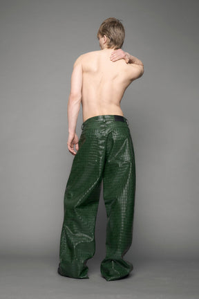 model wearing green vegan leather croc pants