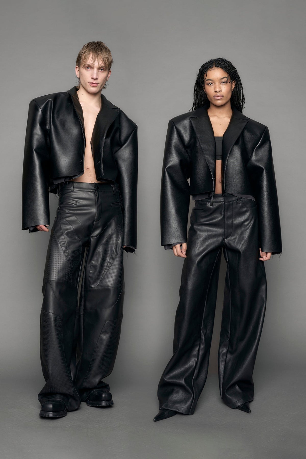 model wearing black vegan leather blazer cropped