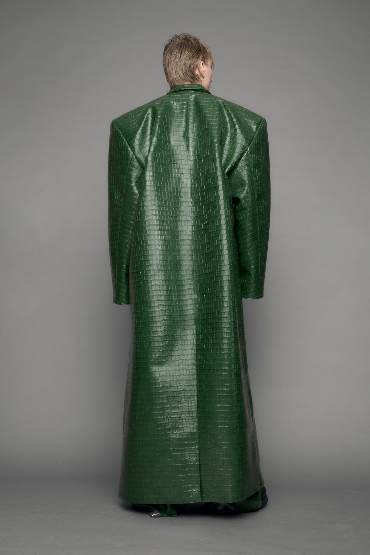 model wearing green croc vegan leather elongated blazer coat