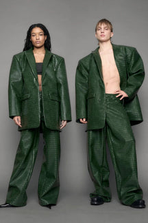 model wearing green croc vegan leather blazer