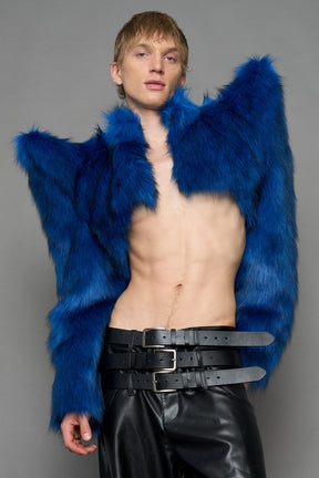 model wearing blue faux fur crop jacket with sharp shoulder design and black pants