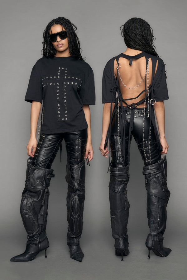 model wearing black print shredded t-shirt with chains