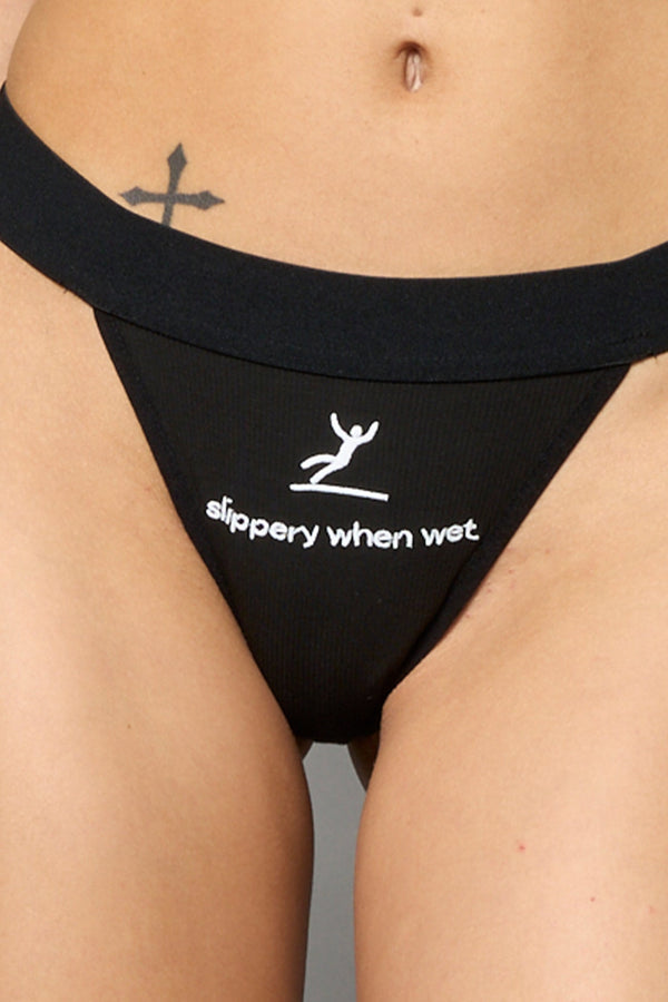 NAMILIA Slippery When Wet Thong - BLACK, xs