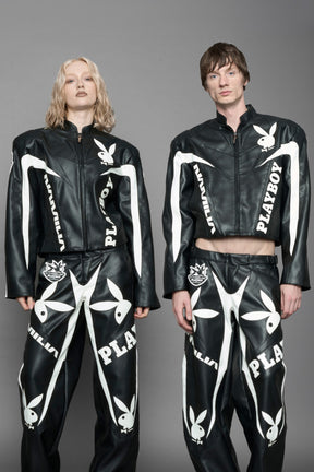 model wearing vegan leather NAMILIA x Playboy biker jacket with broad shoulder design