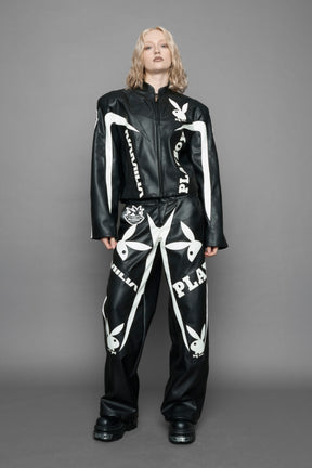 model wearing vegan leather NAMILIA x Playboy biker jacket with broad shoulder design