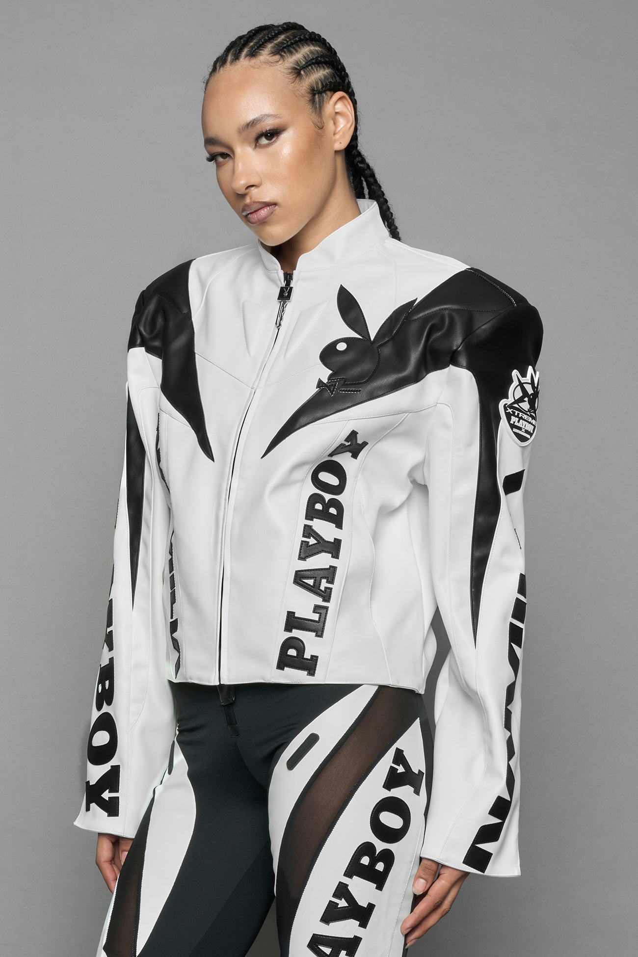 model wearing vegan leather NAMILIA x Playboy biker jacket with broad shoulder design