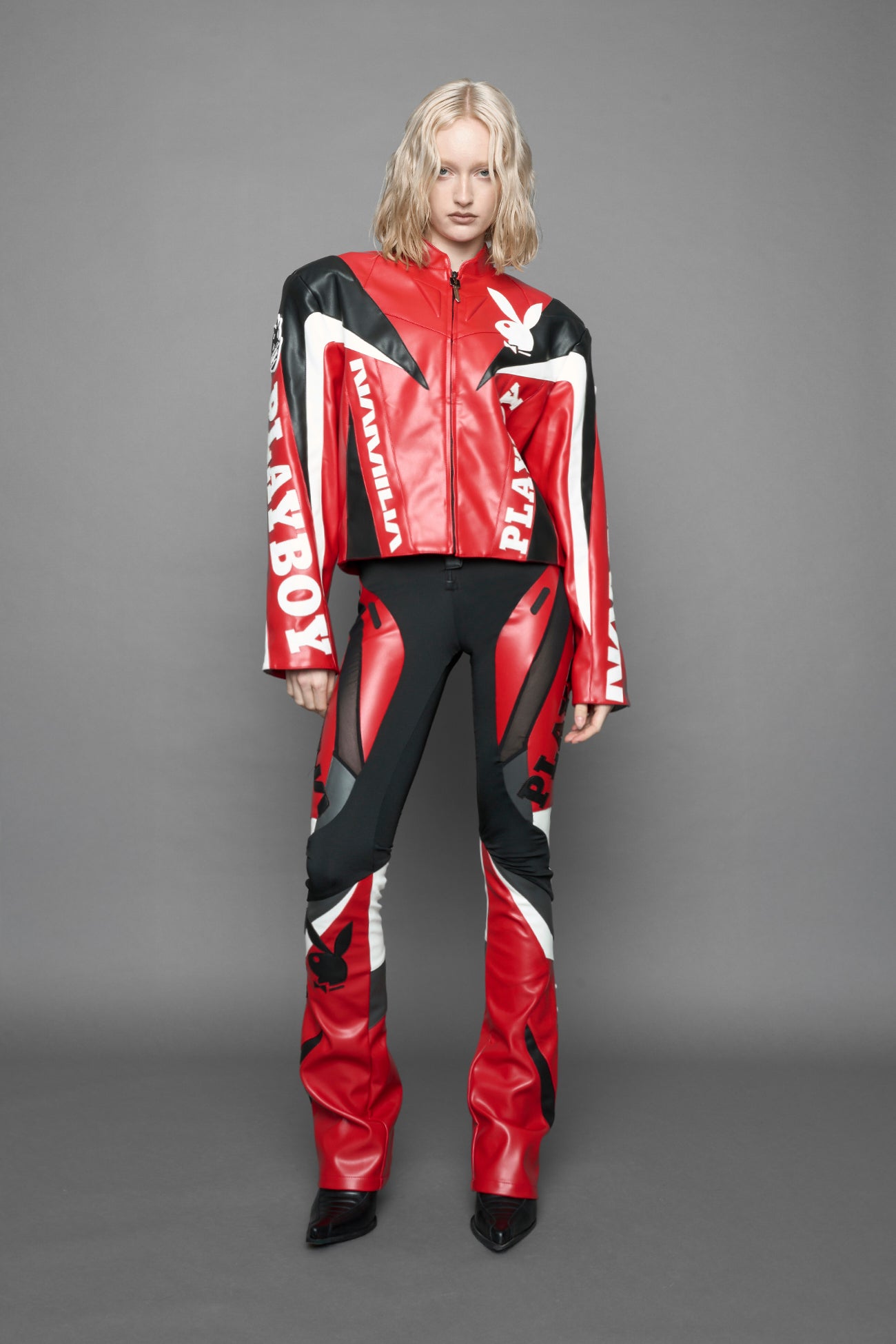 model wearing vegan leather NAMILIA x Playboy biker jacket with broad shoulder design