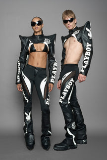 model wearing black white vegan leather NAMILIA x PLAYBOY crop bolero jacket with sharp shoulder design 