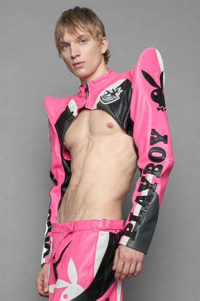 model wearing pink white vegan leather NAMILIA x PLAYBOY crop bolero jacket with sharp shoulder design 