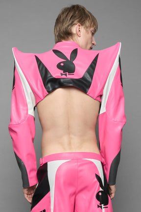 model wearing pink white vegan leather NAMILIA x PLAYBOY crop bolero jacket with sharp shoulder design 