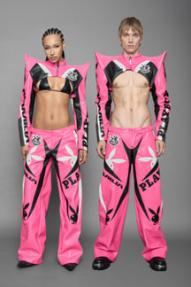 model wearing pink white vegan leather NAMILIA x PLAYBOY crop bolero jacket with sharp shoulder design 