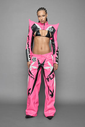 model wearing pink white vegan leather NAMILIA x PLAYBOY crop bolero jacket with sharp shoulder design 