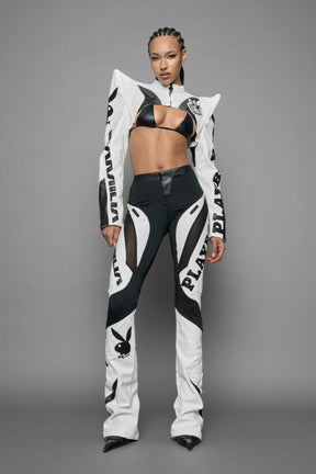 model wearing white vegan leather NAMILIA x PLAYBOY crop bolero jacket with sharp shoulder design 